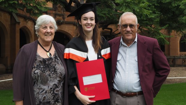 Caitlin Abbott with her grandparents, Estelle and Doug Abbott,  at her graduation.