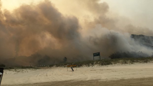 The view of the Fraser Island bushfire from Cathedral Beach on the eastern side of the island. 