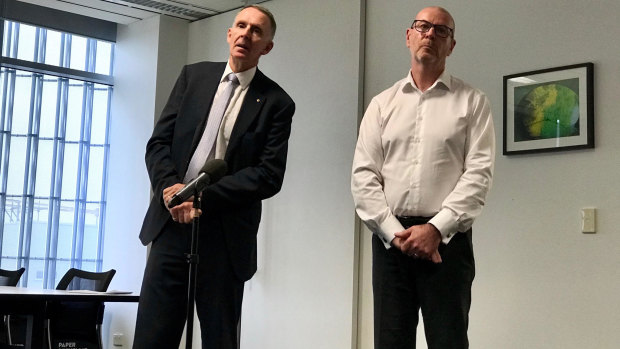 AAP chairman Campbell Reid and CEO Bruce Davidson announcing the closure in March. The newswire was rescued from closure months later.