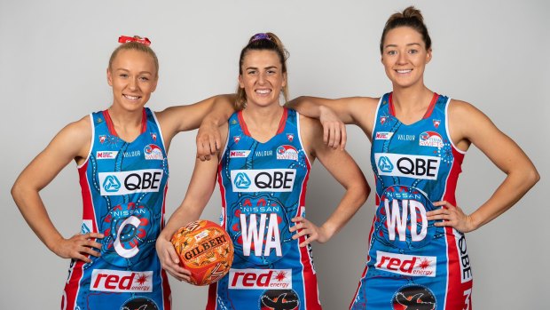 Swifts stars Tayla Fraser, Maddy Proud and Lauren Moore with their Indigenous Round uniform.