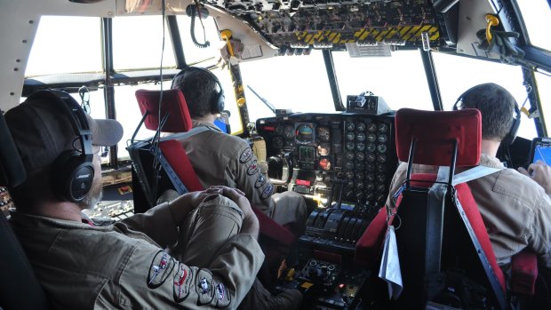 Inside the cockpit of a Hercules C-130.