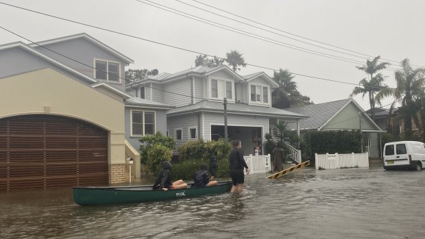 Residents evacuate low-lying areas around Narrabeen Lagoon.