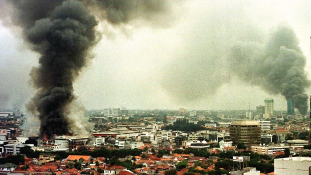 Smoke rises from burning buildings during Jakarta's unrest in May 1998.