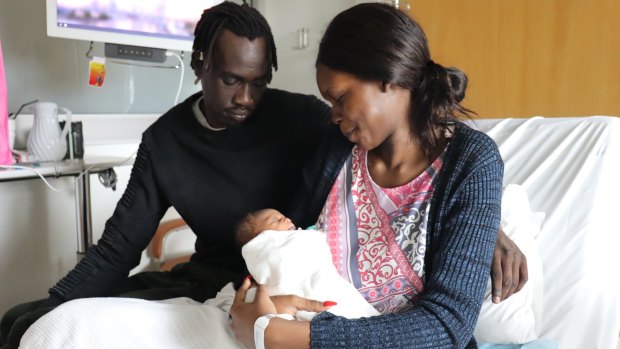Selina and Deng marvel over daughter Soriah, who was born at Mater Mother's Private Hospital.