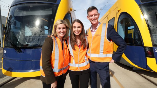 Gold Coast-born state government ministers Shannon Fentiman, Meaghan Scanlon and Mark Bailey welcome three of five new light-rail trams to the Gold Coast.