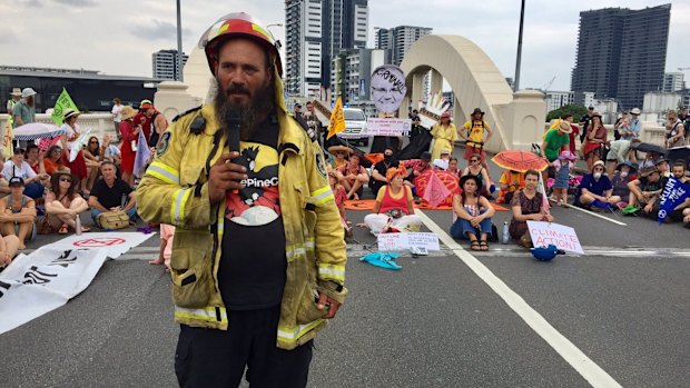 NSW rural firefighter Murray Drechsler speaking during the Extinction Rebellion occupation of the William Jolly Bridge.