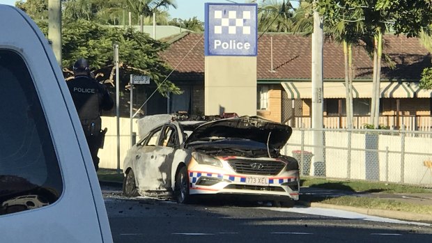 Police were treating the fire, which gutted a patrol car outside a police station in Brisbane's south on as suspicious.