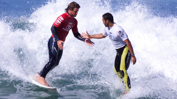 Garcia pictured with Australian surfing champion Mark Occhilupo in 2001.