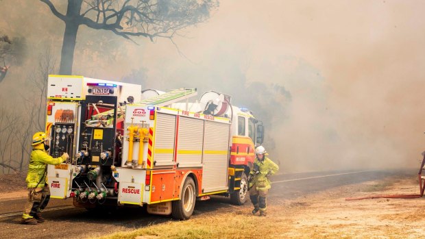 Firefighters working to control a bushfire in Deepwater, central Queensland, in November 2018.