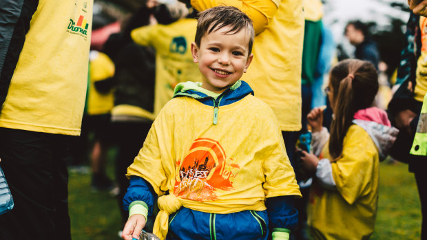 The Darkness Into Light walk in aid of suicide prevention in a rainy Bondi on Saturday.