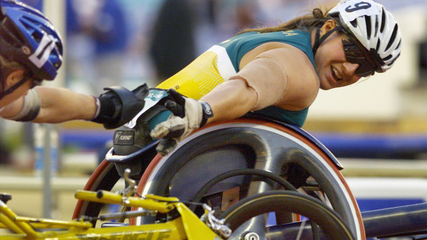 Louise Sauvage receives the  congratulations of Jean Driscoll of the United States after winning the 1500-metre final of the Sydney Paralympic Games.