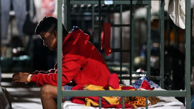 A migrant rests in a temporary shelter erected to house hundreds of  Venezuelans in Boa Vista, Roraima, Brazil.