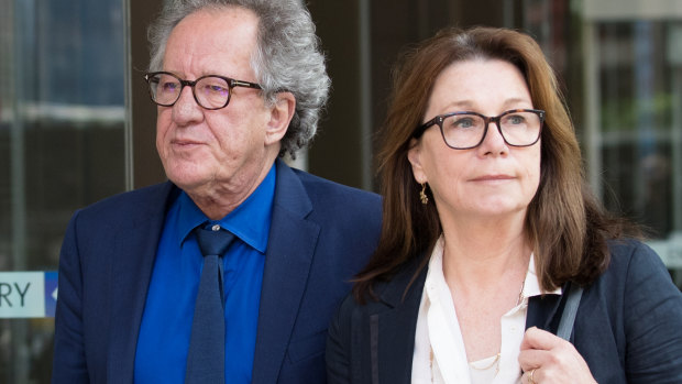 Geoffrey Rush with his wife, Jane Menelaus, leave the Supreme Court on the final day of his defamation case against News Corp