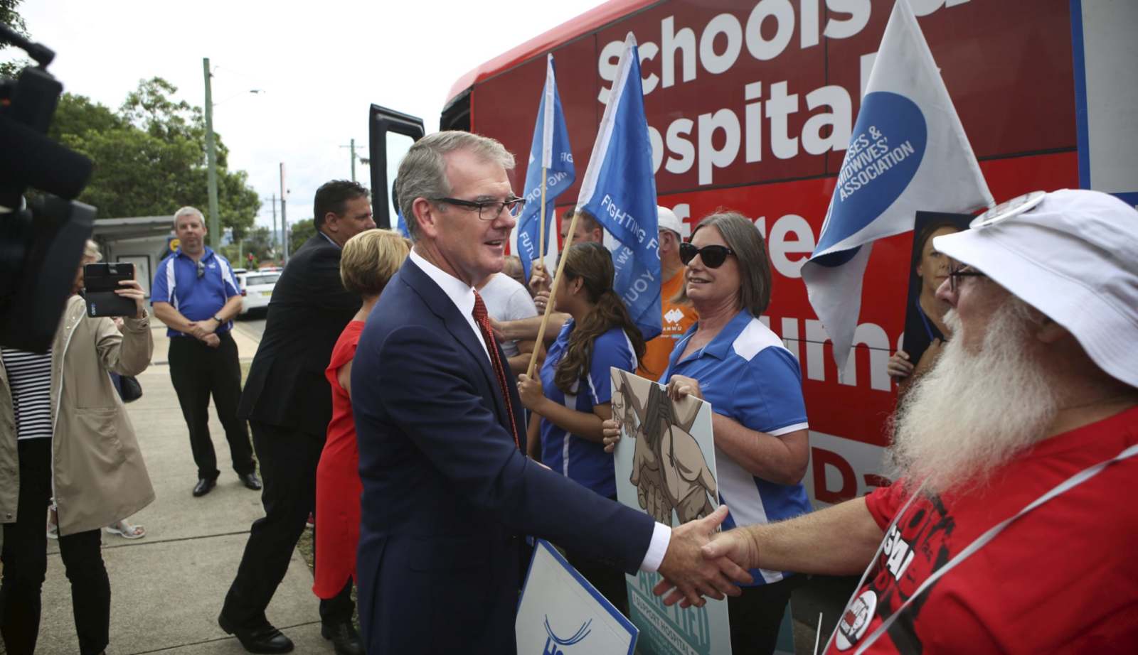 NSW Labor Opposition Leader Michael Daley gets a warm reception from HSU members at Nepean Hospital in Sydney's outer Western suburbs prior to tomorrow's State Election. 
