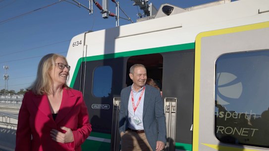 The Labor leaders disembark a Metronet train on the new line.