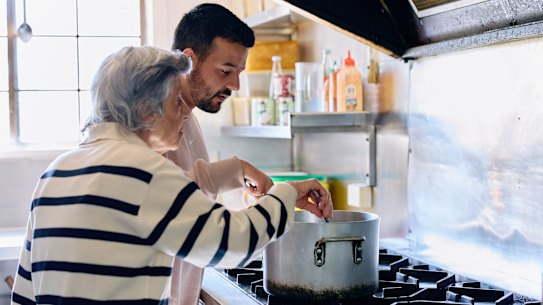 Fassy and Hinton cook together at Sultan’s Kitchen.