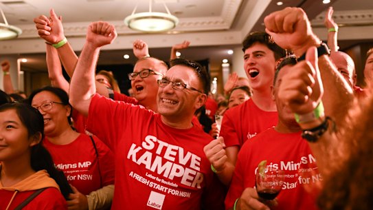 Labor supporters react to positive results in the NSW state election at Chris Minns’ Labor Party reception at the Novotel Hotel in Brighton-Le-Sands