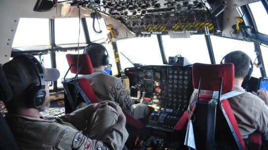 Inside the cockpit of a Hercules C-130.