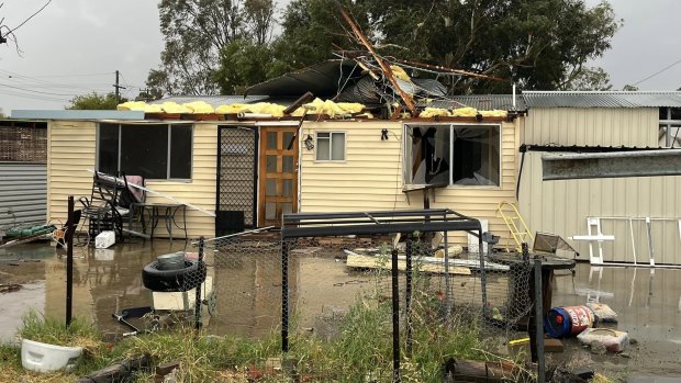 At least 130 flights cancelled, houses damaged as strong winds lash NSW
