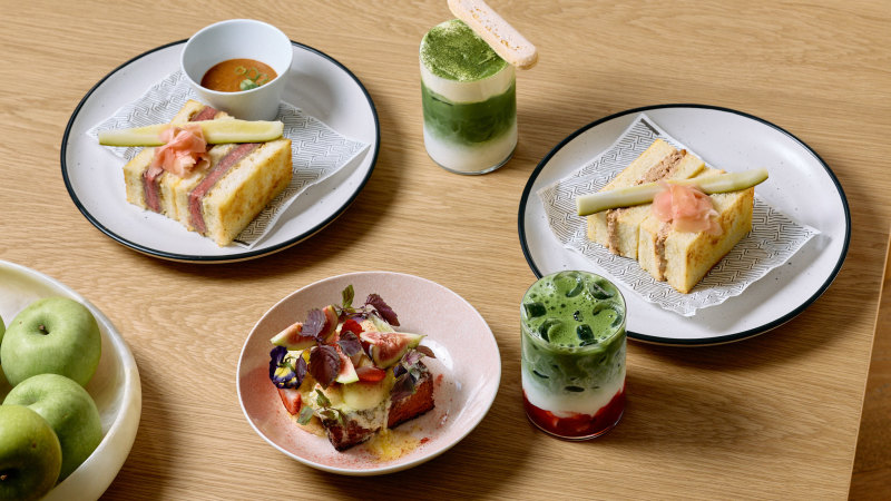 Diners queuing out the door for sandos at this Japanese vinyl cafe