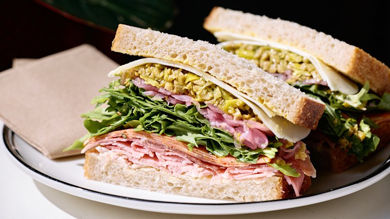 Three Australian outlets review a deli sandwich in Brisbane