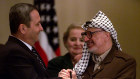 Ehud Barak and Yasser Arafat, before their peace plan fell apart in 2000.