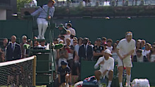Nick Kyrgios speaks to the chair umpire.