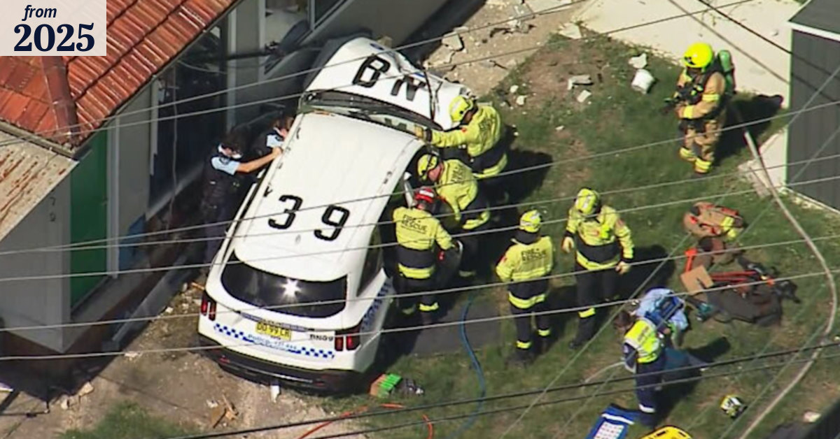 Officer trapped in police car that crashed into western Sydney home