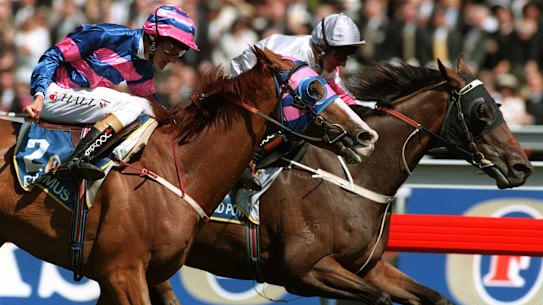 Might and Power, with Jim Cassidy aboard, edges Doriemus in the thrilling 1997 Melbourne Cup.