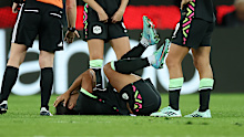 Sam Kerr injured on the ground. 