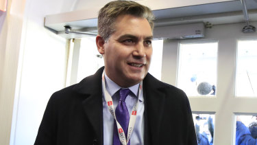 CNN's Jim Acosta enters the White House press briefing after having his access reinstated last week.