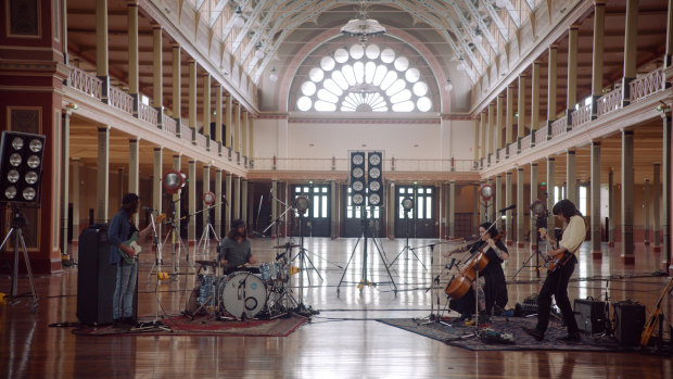 Courtney Barnett and band, inside Melbourne's World Heritage-listed Royal Exhibition Building.