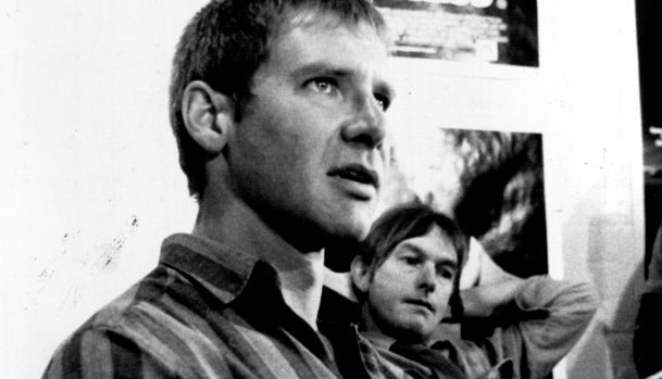 Harrison Ford in Sydney in 1985 to promote Witness, with director Peter Weir in the background. 
