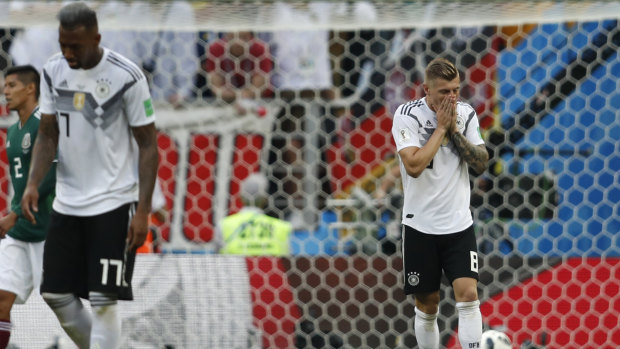 Toni Kroos and Jerome Boateng react to another near-miss