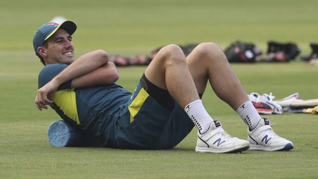 Pat Cummins warms up in Mumbai ahead of Australia's first one-day international match against India.