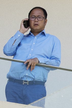 Huang Xiangmo on the balcony of his former Mosman home.