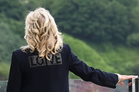 ‘Love from America’: Jill Biden, wearing a jacket with the phrase “Love” on the back, stands outside the Carbis Bay Hotel.