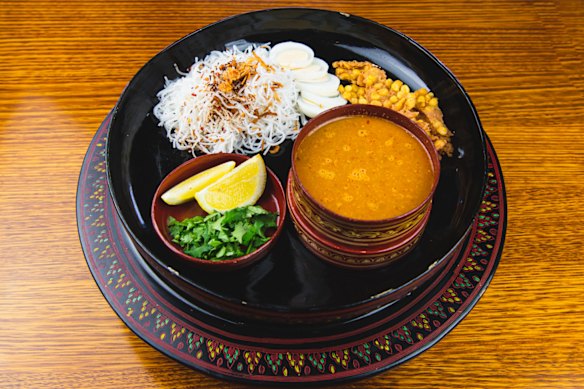 Burmese House’s mohinga, a seafood noodle soup, is finished with a hard-boiled egg and more.