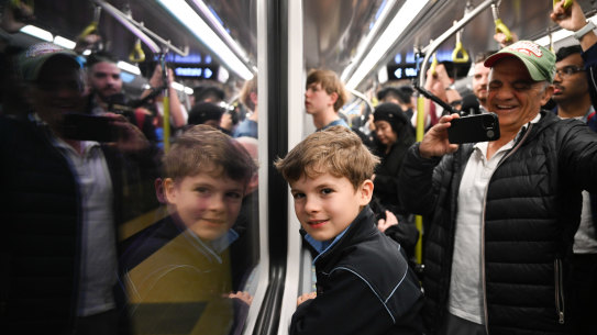 Adam Riakos travels with his grandfather Mosh Riakos on the first Metro train on the M1 from Sydenham sation to Chatswood.