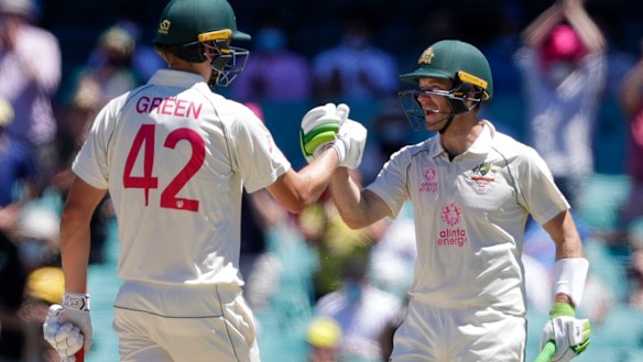 Paine congratulates Cameron Green on his half-century.