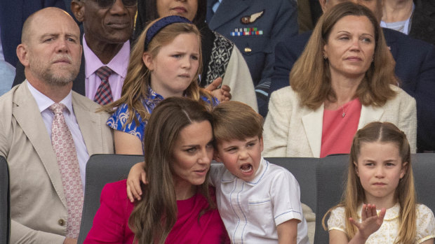 Mike Tindall, left, sitting behind the Duchess of Cambridge and Prince Louis on Sunday.