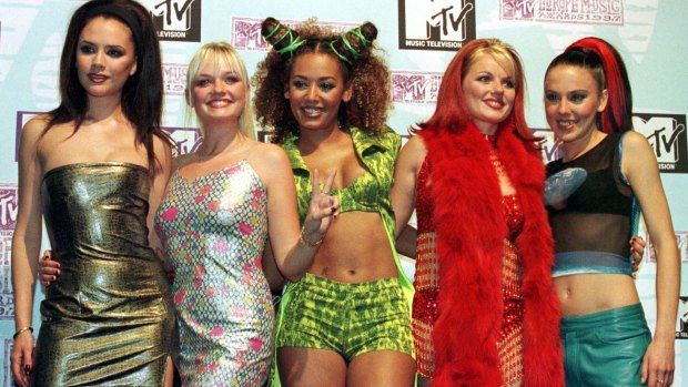 Victoria Beckham (left) with the Spice Girls in 1997.