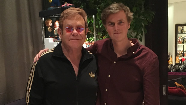 Sir Elton John and Tate Sheridan in 2015.