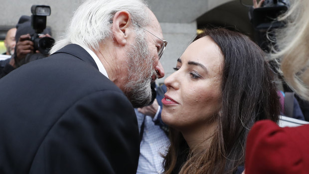 Julian Assange's father John Shipton and girlfriend Stella Morris greet each other in front of the Central Criminal Court Old Bailey in London.
