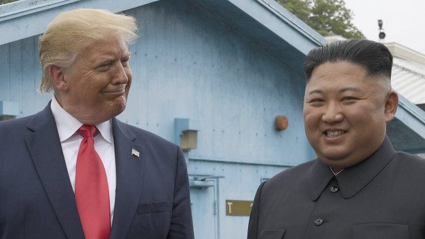 Donald Trump and Kim Jong-un in the Demilitarised Zone on Sunday. Despite three historic meetings, North Korea hasn't  dialled down its nuclear ambitions.