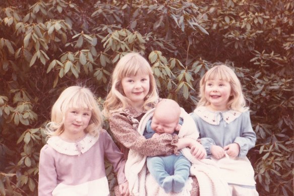 Kirsty McRae (far left) with her siblings at the B&B her parents ran in Scotland.