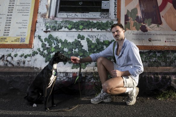 Harrison Watt, pictured with his two-year-old whippet Tippy, says Fitzroy is a safer place to walk and cycle since speed limits were reduced.