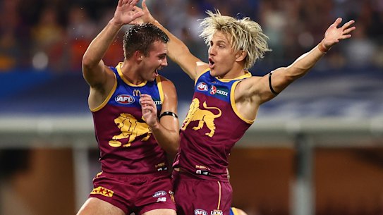Darcy Wilmot and Kai Lohmann of the Lions celebrates a goal.