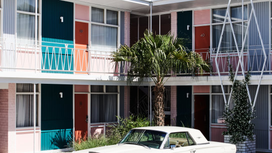 Even the under croft for parking one’s Cadillac is painted a dusty pink.