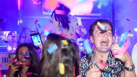 Londoners celebrate the end of restrictions at The Piano Works in Farringdon on Monday morning.